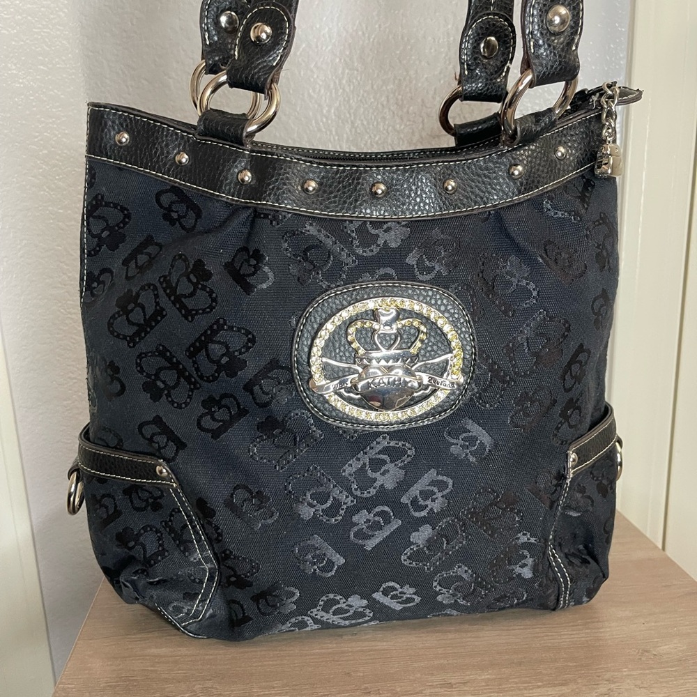 Kathy Van Zeeland Chic Black Tote with Silver Emblem